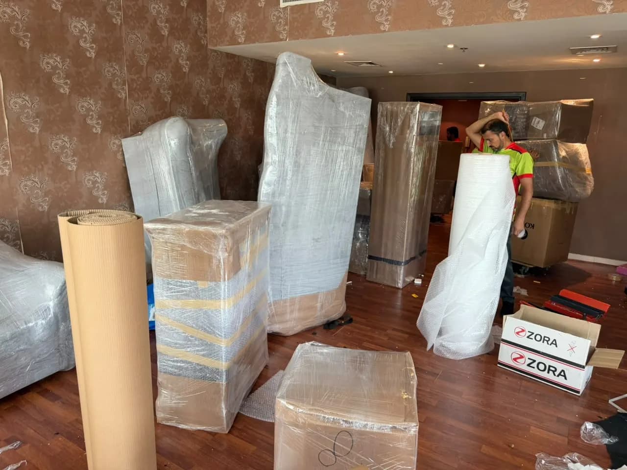 Smart Movers UAE crew packing and moving furniture in Dubai, UAE, job 10