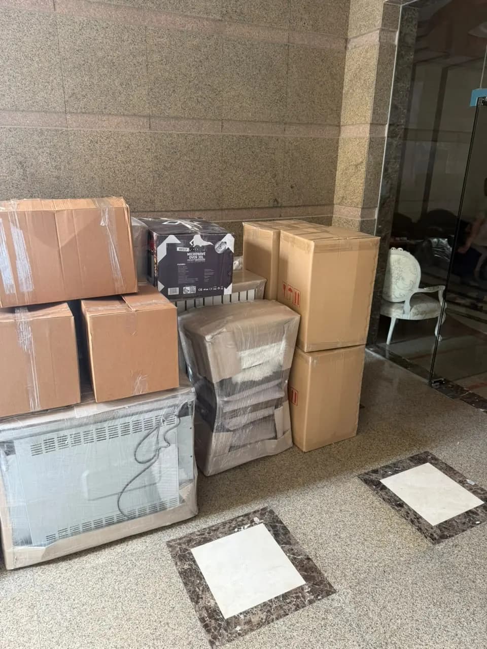 Smart Movers UAE crew packing and moving furniture in Dubai, UAE, job 13