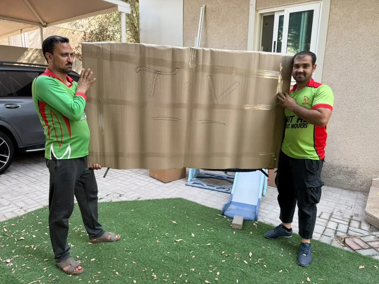 Smart Movers UAE crew packing and moving furniture in Dubai, UAE, job 18