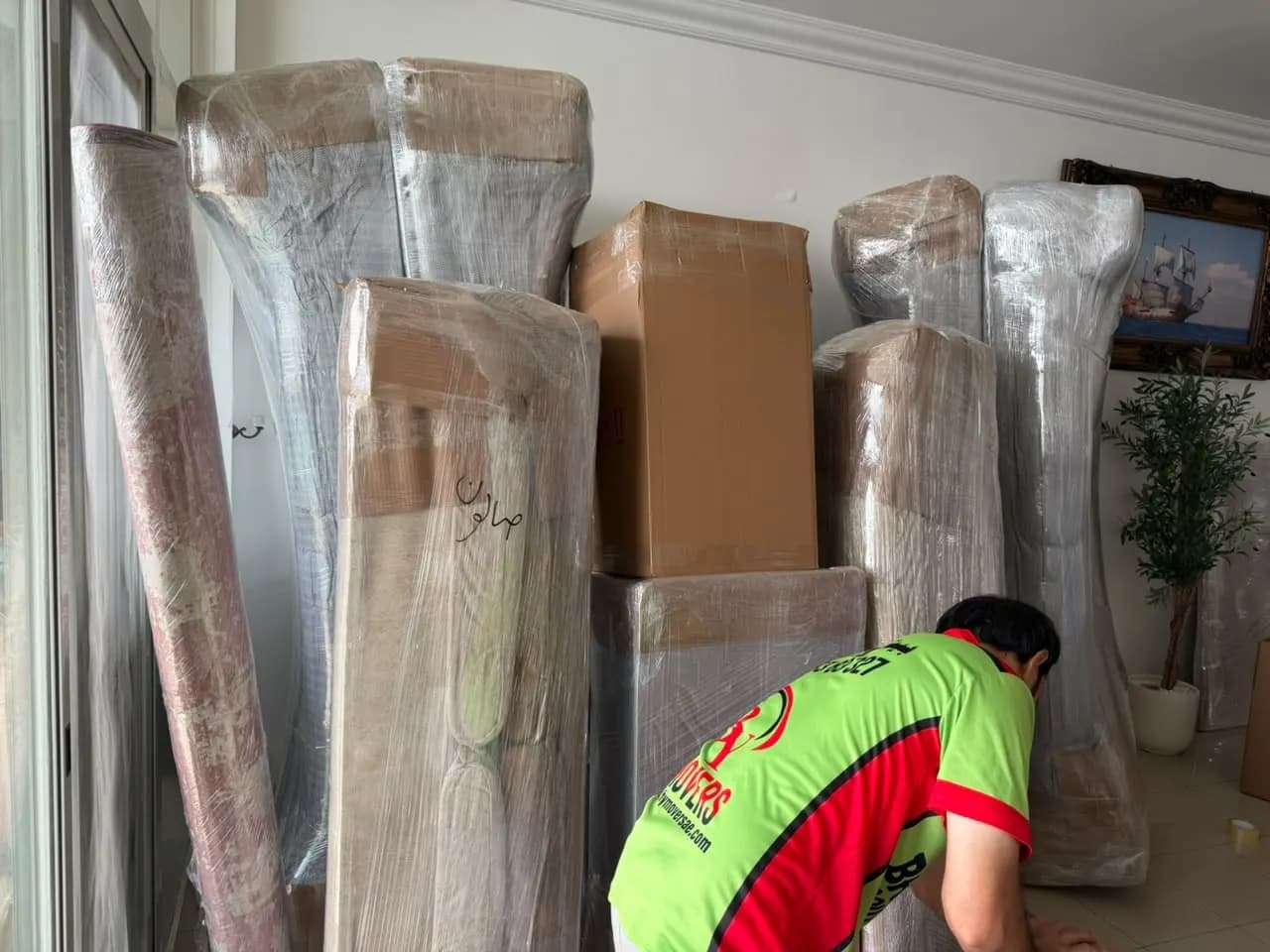 Smart Movers UAE crew packing and moving furniture in Dubai, UAE, job 20