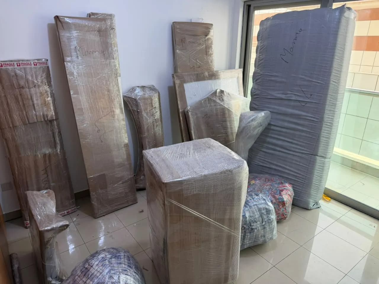 Smart Movers UAE crew packing and moving furniture in Dubai, UAE, job 22
